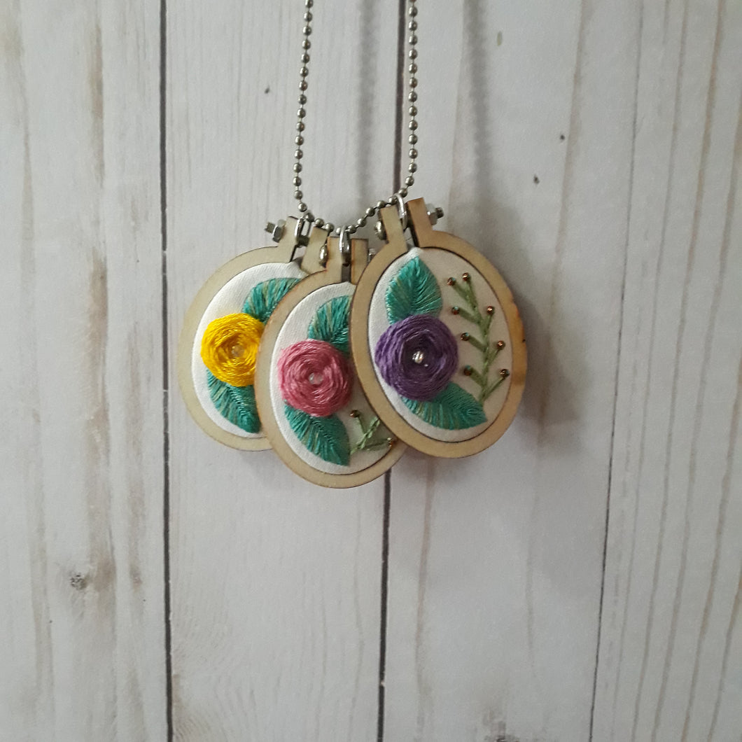 floral embroidered pendants